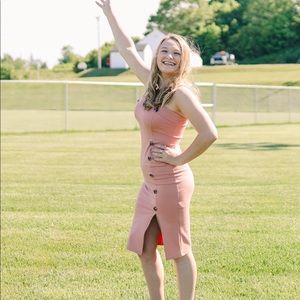 Plink mid length dress with a zip up back and leg slit!